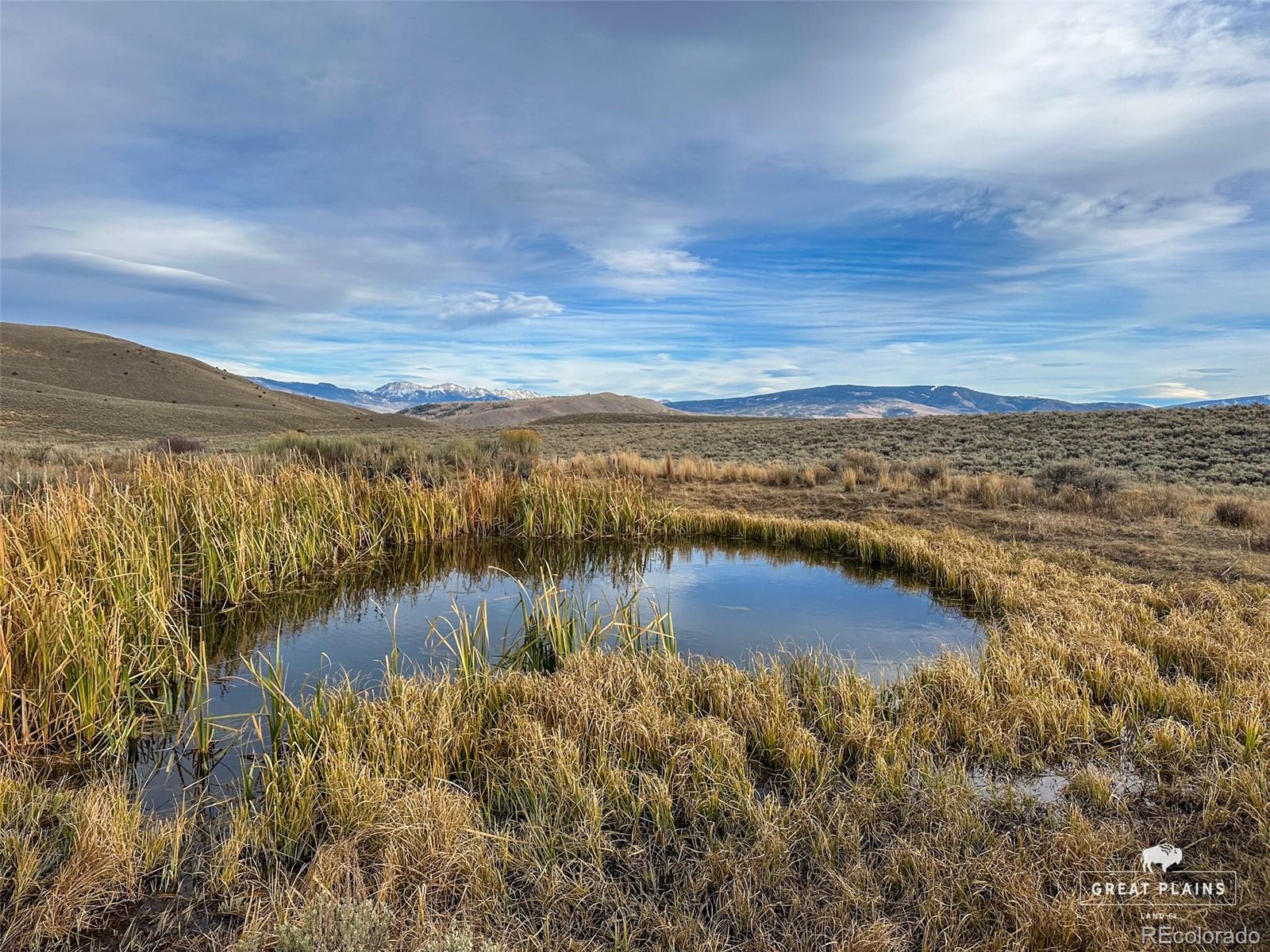 0 Sweet Spring Road Eagle, CO 81631 - Photo 1 of 12 a view of a lake with a city