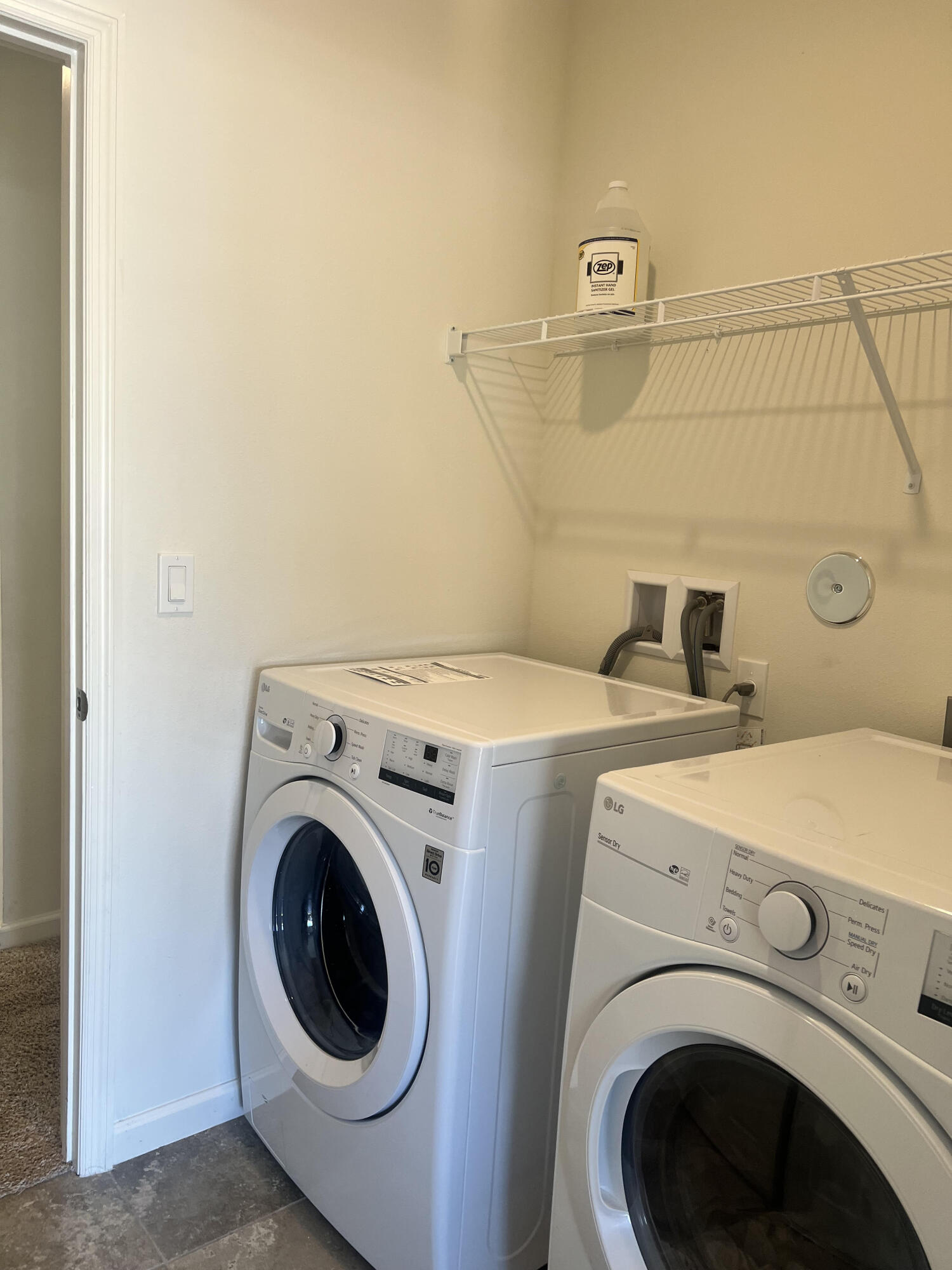 3213 Trinity Circle Fort Pierce, FL 34945 - Photo 18 of 20 a utility room with dryer and washer