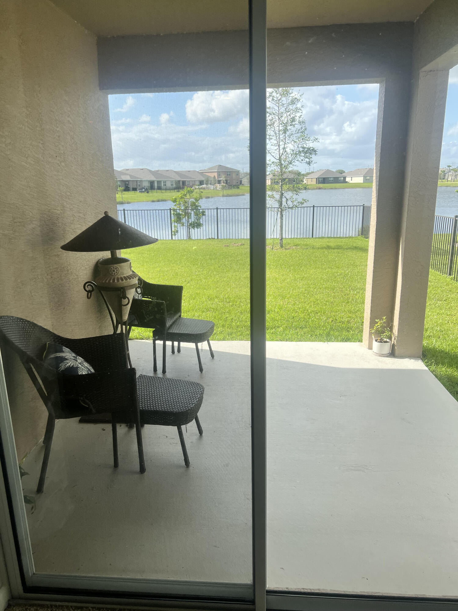 3213 Trinity Circle Fort Pierce, FL 34945 - Photo 20 of 20 a view of a room with furniture and a window