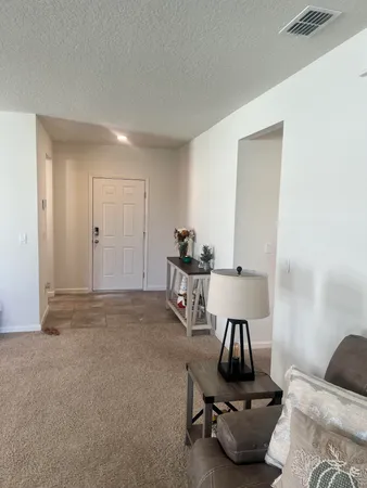 a room with furniture and a window