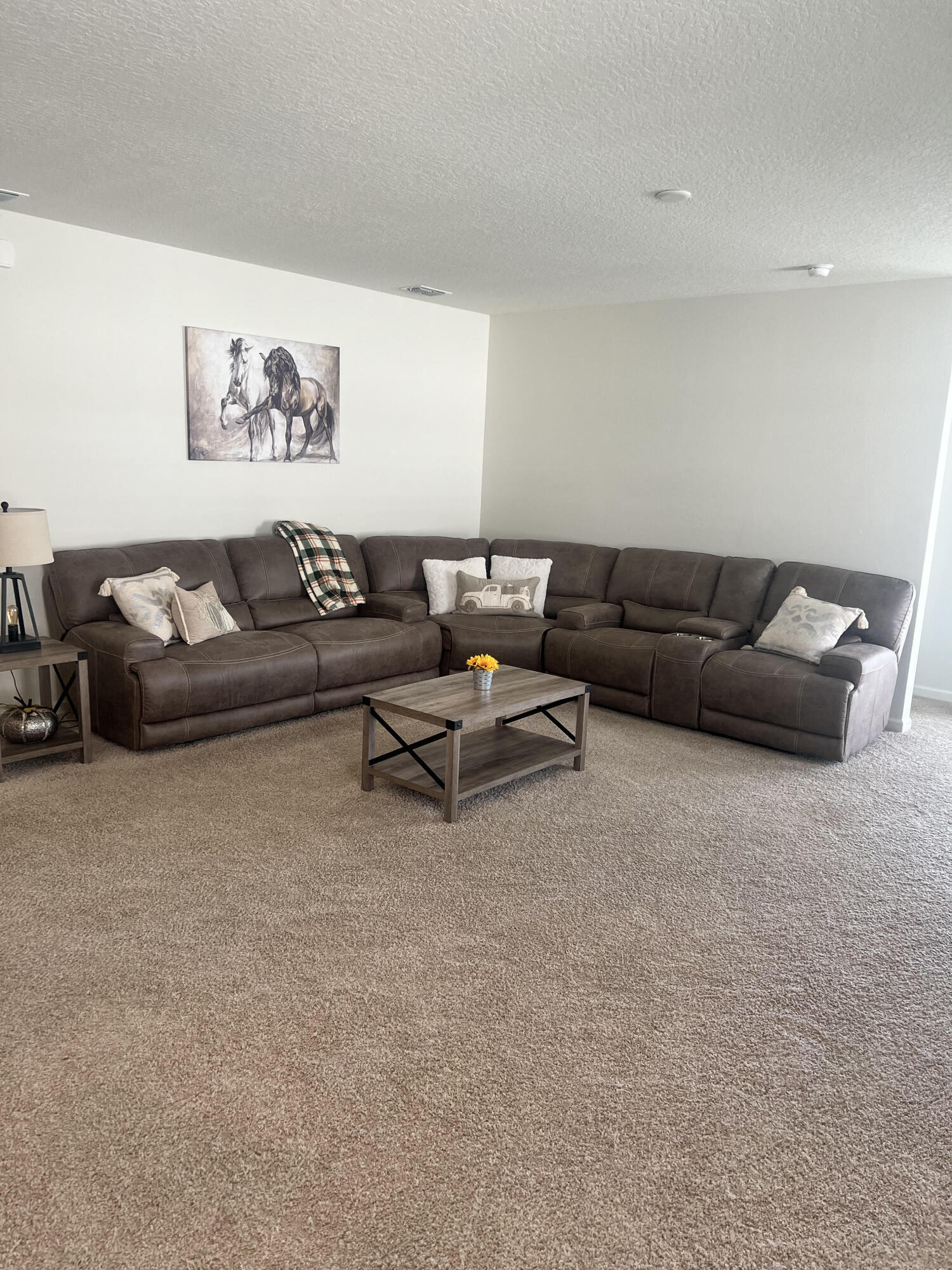 3213 Trinity Circle Fort Pierce, FL 34945 - Photo 8 of 20 a living room with furniture and white walls