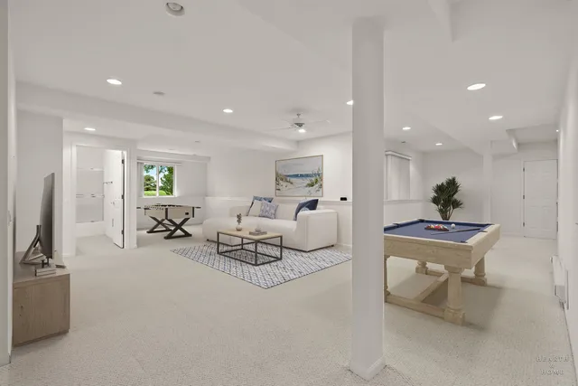 a living room with furniture and a table