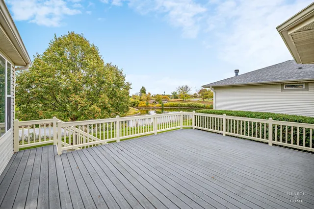 a view of a balcony with wooden floor