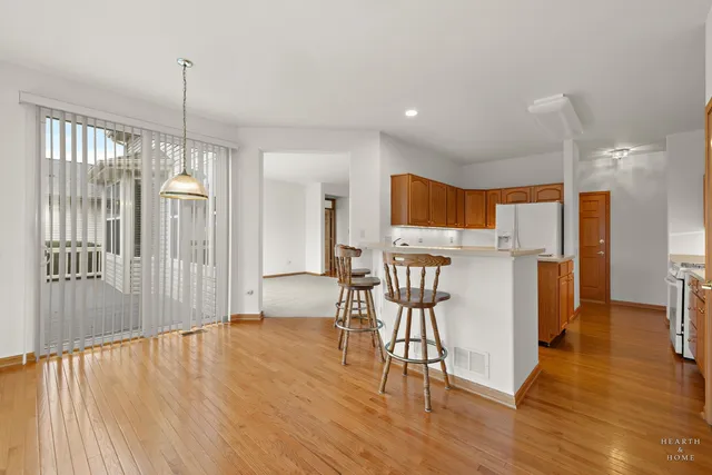 a view of a kitchen and dining room