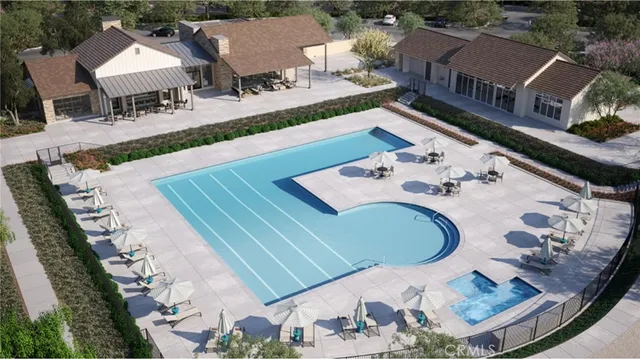 an aerial view of a house with outdoor space