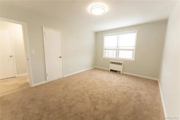 an empty room with a window