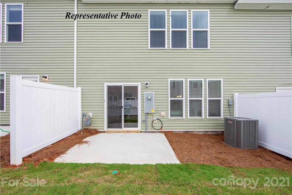 719 Elders Story Road, Unit 346 Fort Mill, SC 29708 - Photo 14 of 19 a front view of a house with a yard and garage