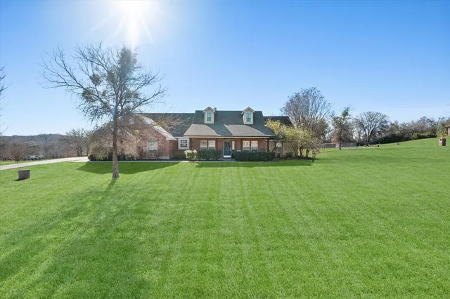 a house view with garden space