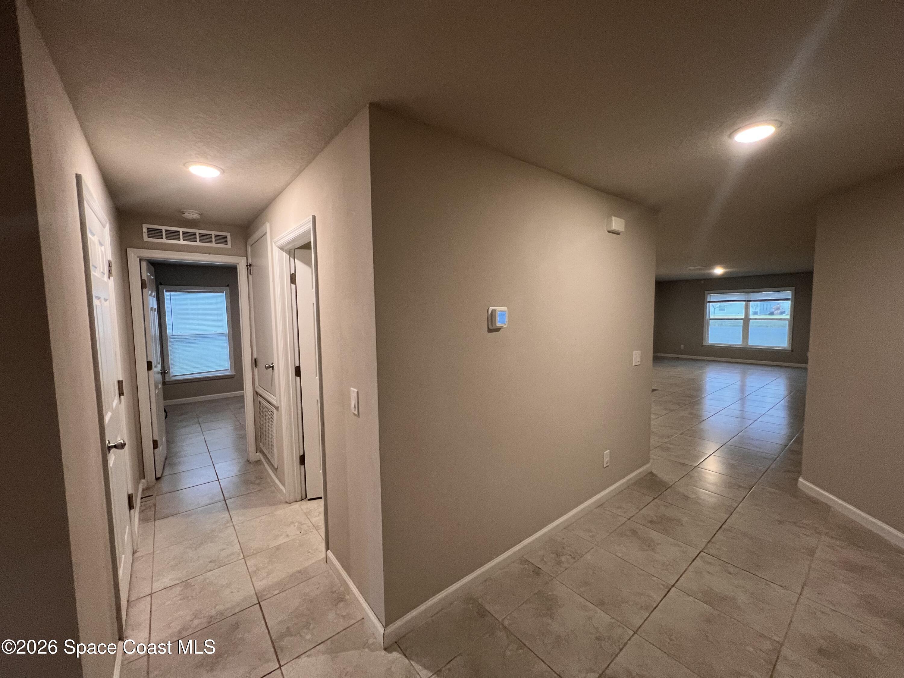545 Cooper Court Palm Bay, FL 32908 - Photo 8 of 19 a view of a hallway
