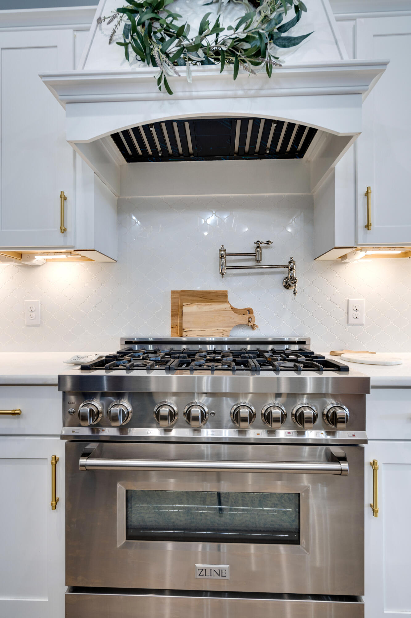 334 Driftwood Point Road Santa Rosa Beach, FL 32459 - Photo 14 of 50 a stove top oven sitting inside of a kitchen