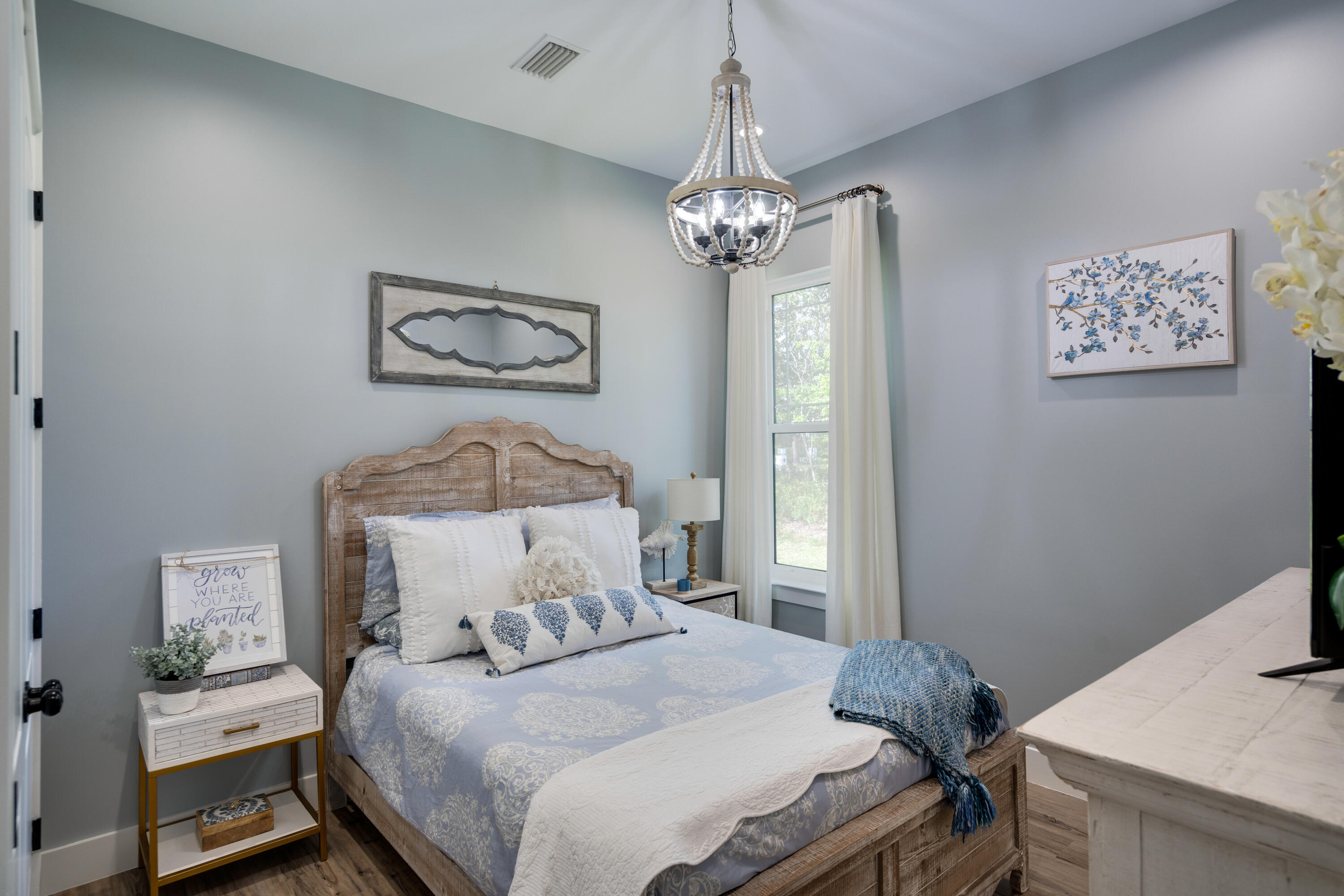 334 Driftwood Point Road Santa Rosa Beach, FL 32459 - Photo 18 of 50 a bedroom with a bed and a table in it