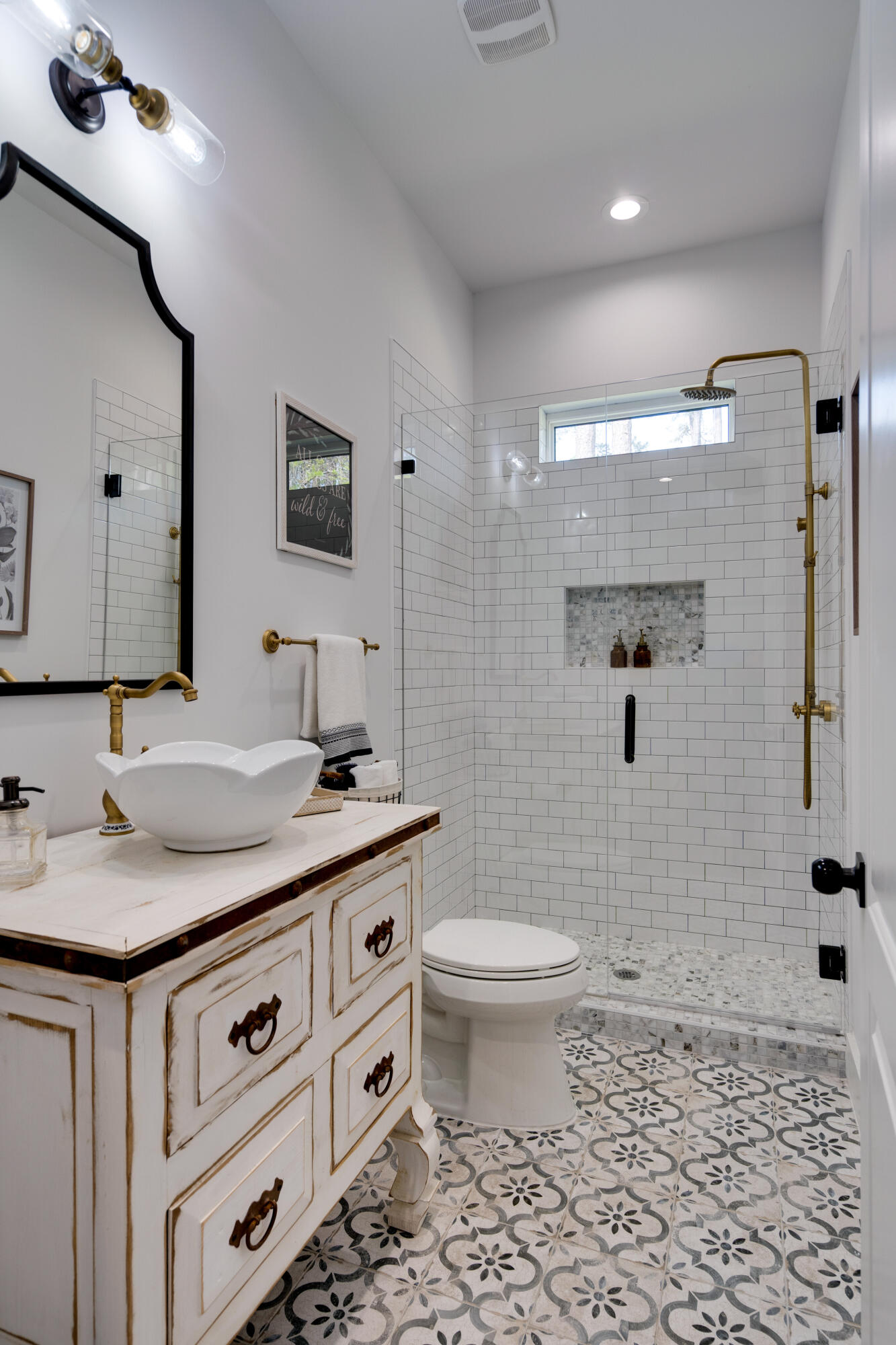 334 Driftwood Point Road Santa Rosa Beach, FL 32459 - Photo 19 of 50 a bathroom with a granite countertop toilet a sink and a mirror