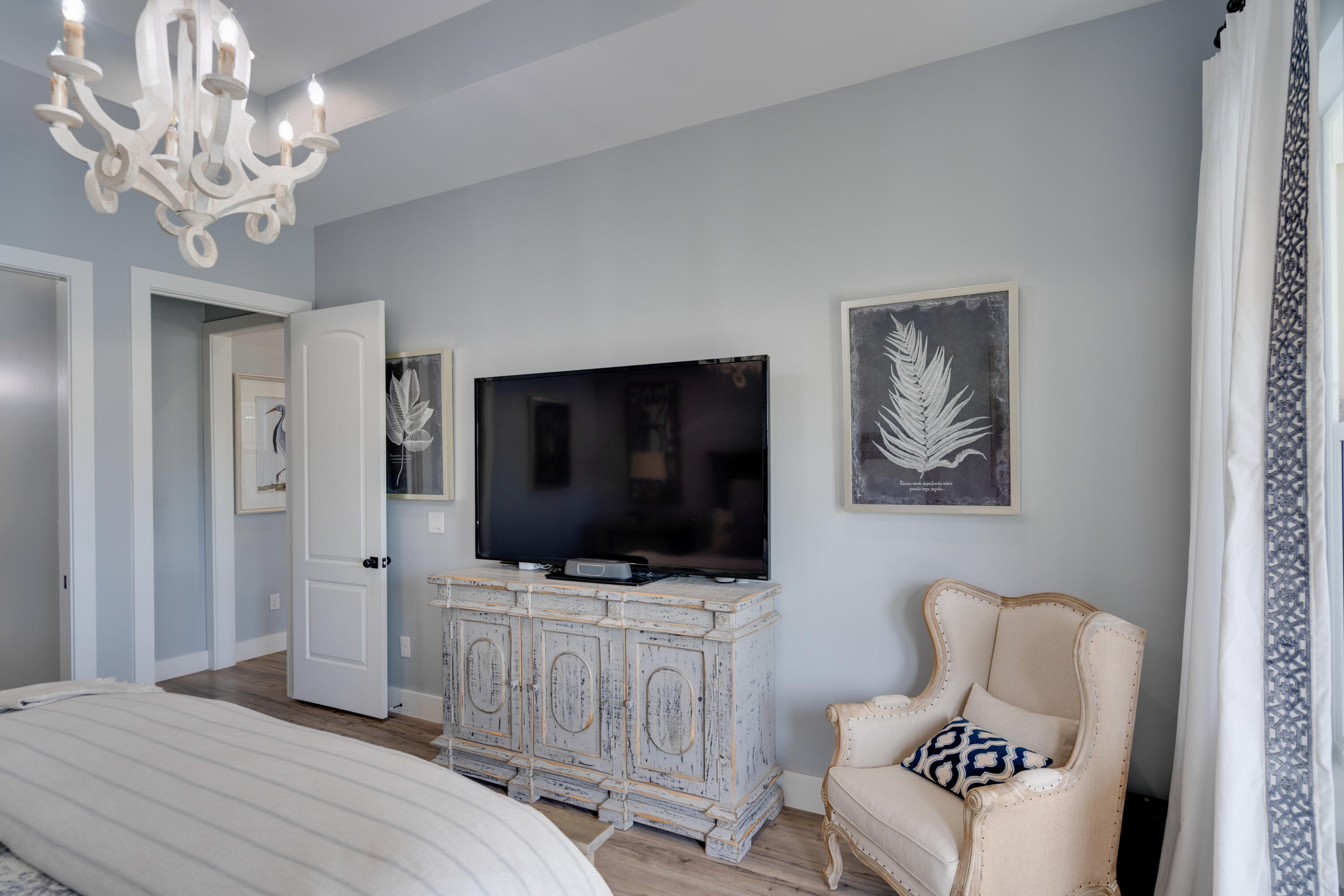 334 Driftwood Point Road Santa Rosa Beach, FL 32459 - Photo 22 of 50 a bedroom with a large bed and a flat screen tv