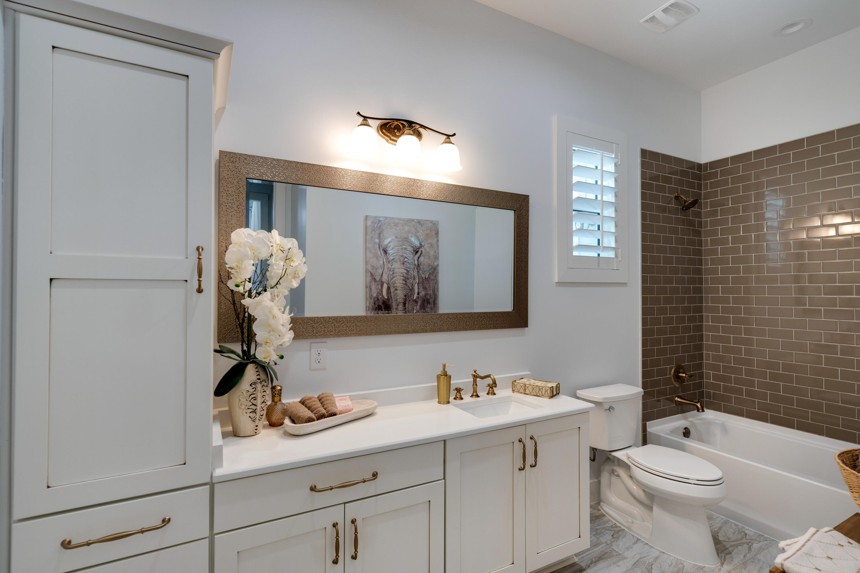 334 Driftwood Point Road Santa Rosa Beach, FL 32459 - Photo 28 of 50 a bathroom with a toilet sink and mirror