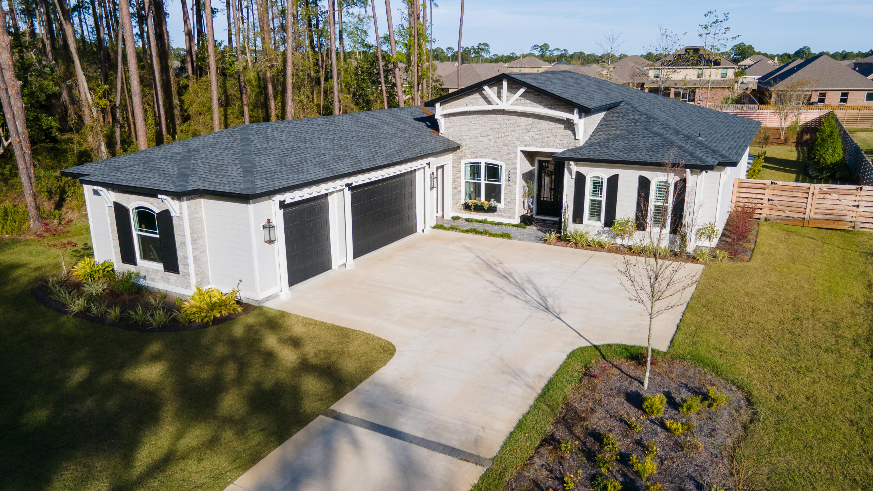 334 Driftwood Point Road Santa Rosa Beach, FL 32459 - Photo 3 of 50 a aerial view of a house with a yard and sitting space