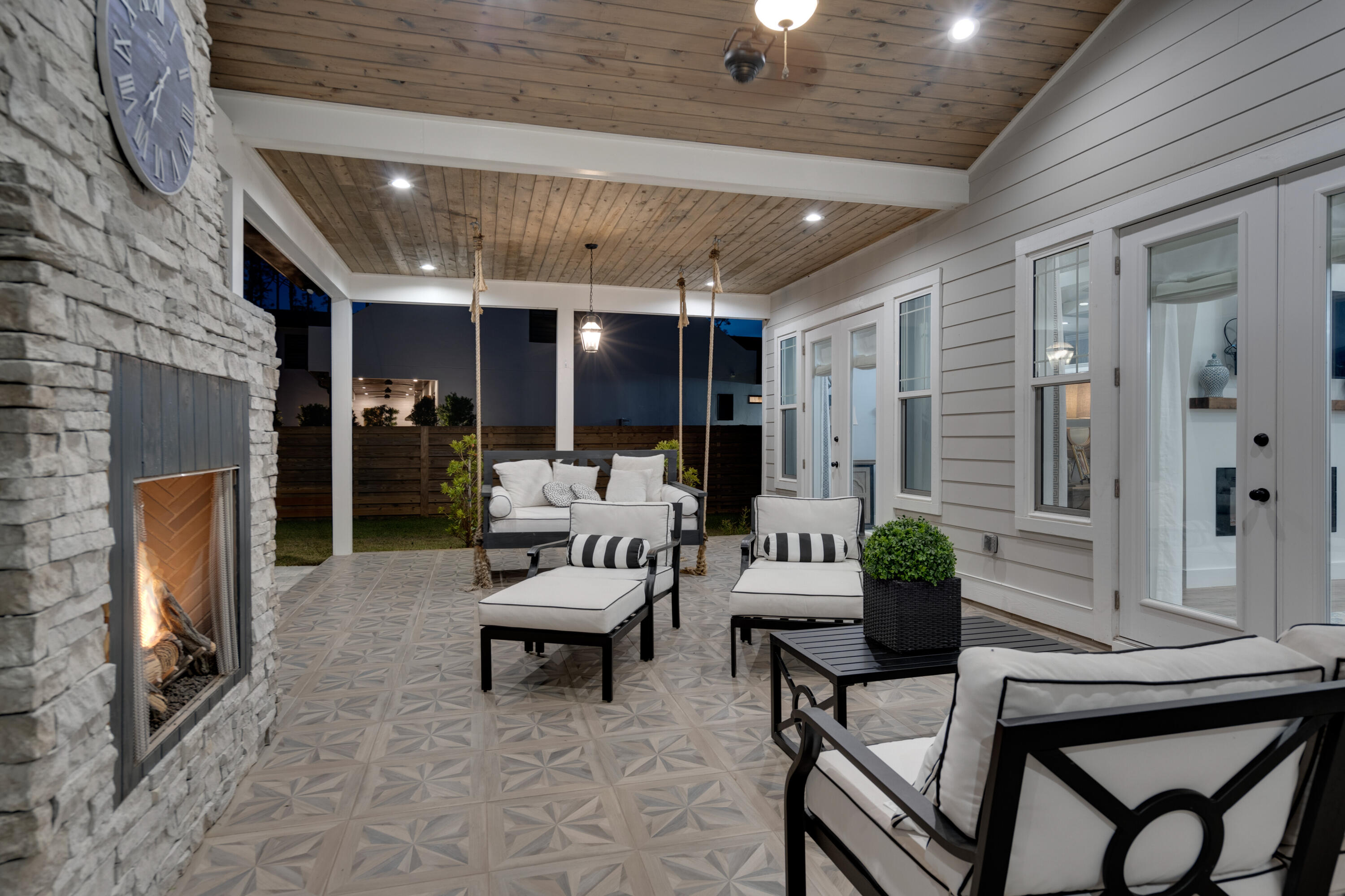 334 Driftwood Point Road Santa Rosa Beach, FL 32459 - Photo 41 of 50 a outdoor living space with furniture and a fireplace
