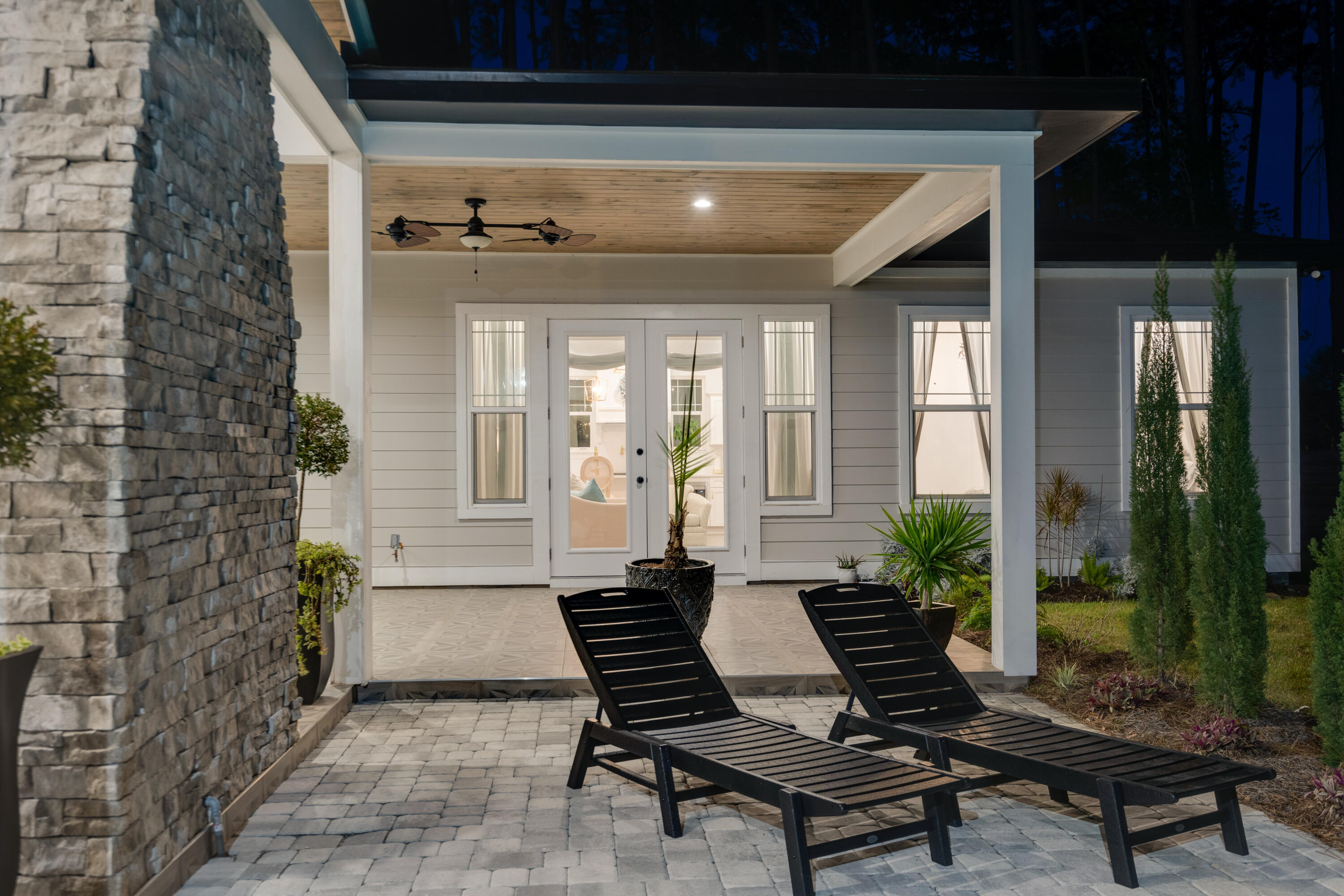 334 Driftwood Point Road Santa Rosa Beach, FL 32459 - Photo 46 of 50 a outdoor living space with furniture and a potted plant
