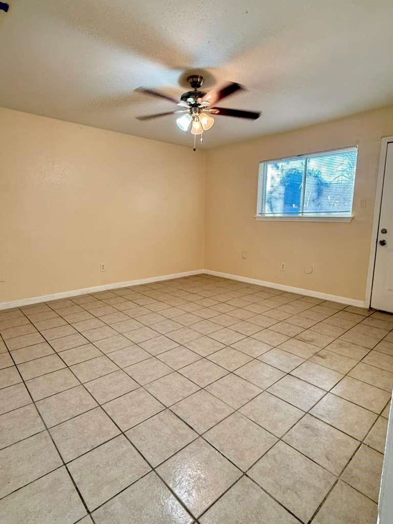 7318 Boone Road, Unit B Houston, TX 77072 - Photo 14 of 23 a view of an empty room and window