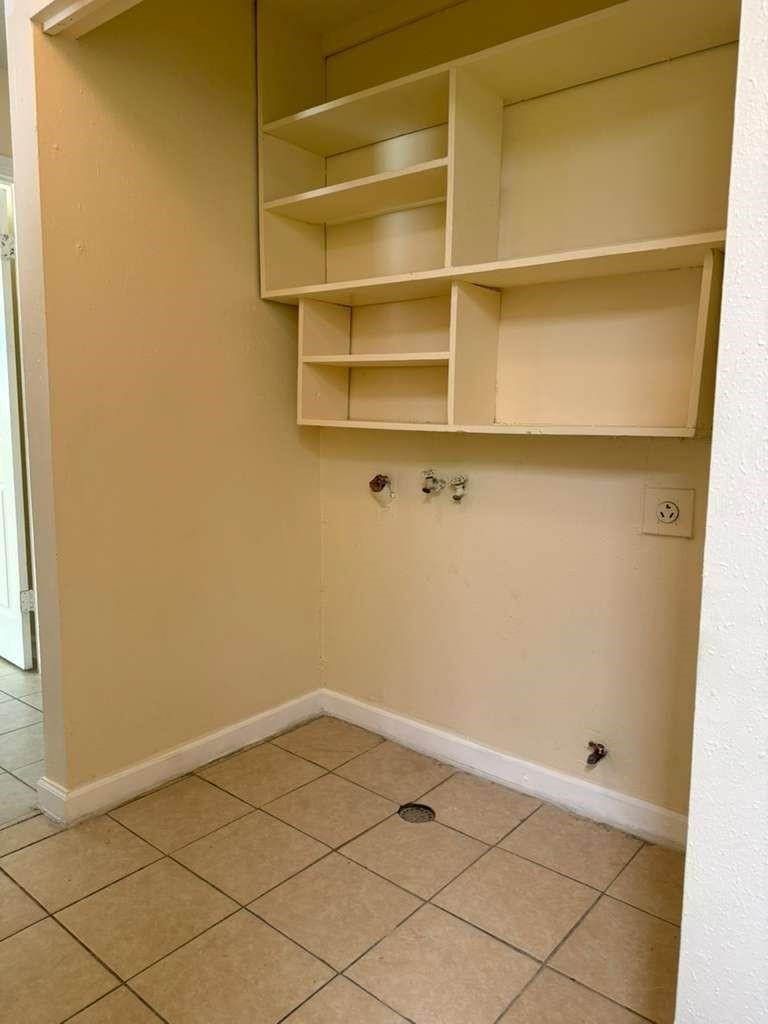 7318 Boone Road, Unit B Houston, TX 77072 - Photo 15 of 23 a view of a room with shelf