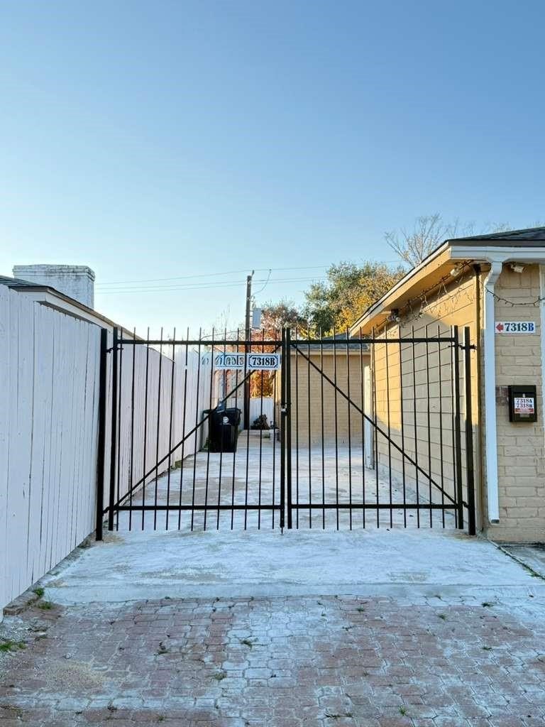 7318 Boone Road, Unit B Houston, TX 77072 - Photo 2 of 23 a view of a backyard
