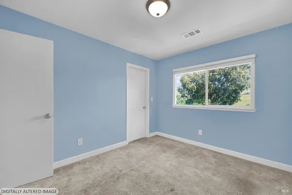 a bathroom with a shower and a toilet