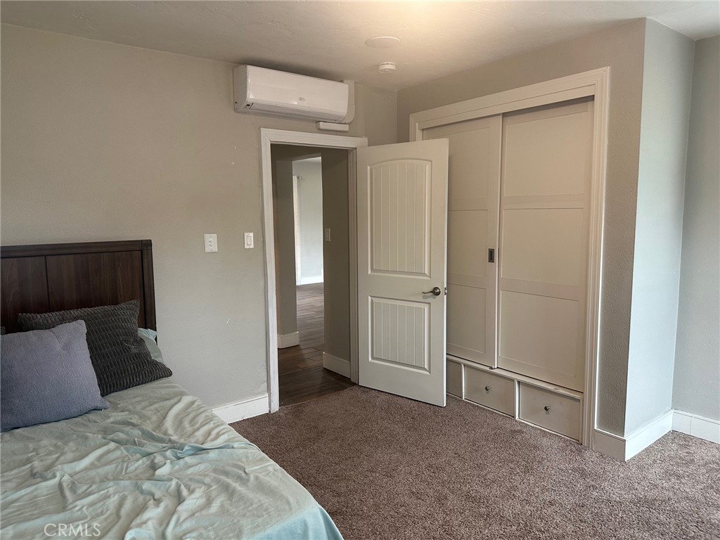 310 Santa Rita Place Banning, CA 92220 - Photo 17 of 27 a bedroom with a bed and a sink
