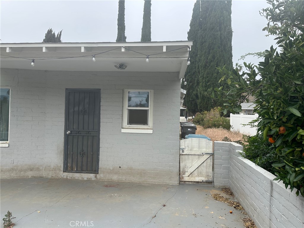310 Santa Rita Place Banning, CA 92220 - Photo 23 of 27 a view of a house with a backyard