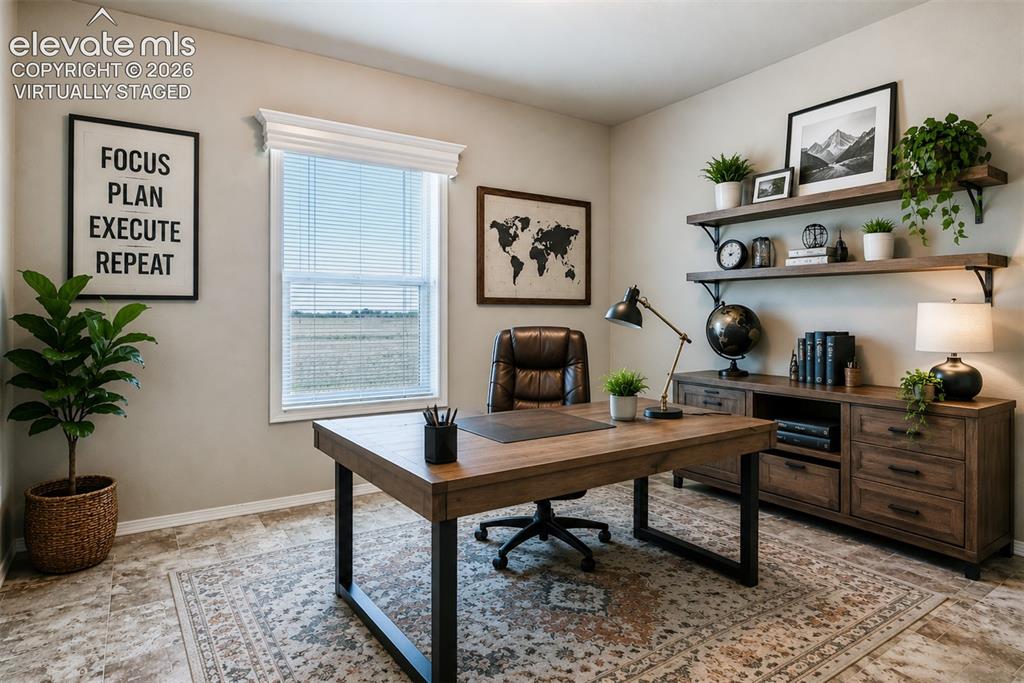 22558 Enoch Road Calhan, CO 80808 - Photo 21 of 50 a view of a workspace with furniture