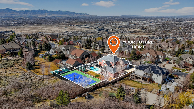 714 Draper Heights Way Draper, UT 84020 - Photo 67 of 88 Aerial perspective of suburban area featuring mountains and a pool area