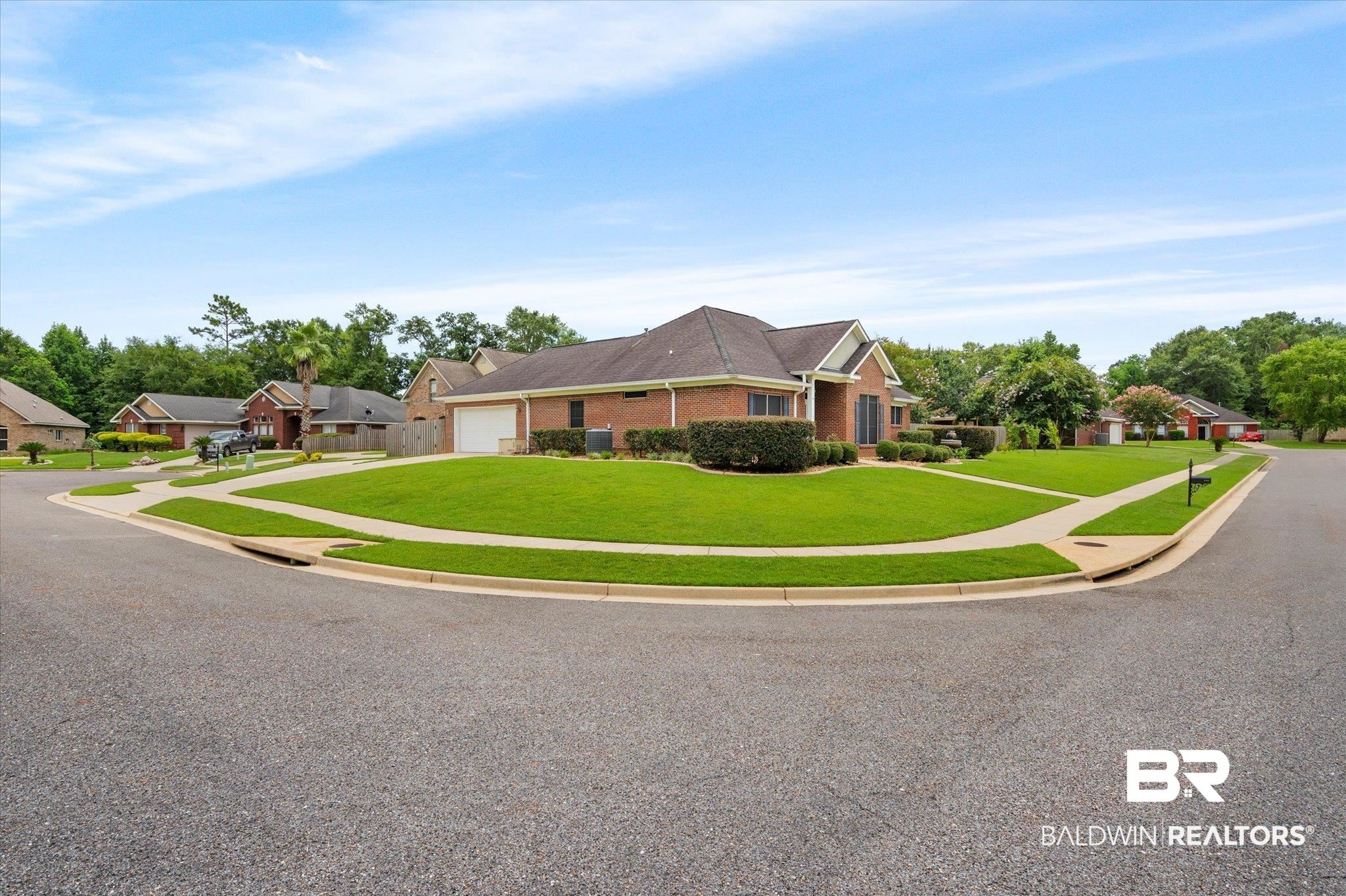 1561 William Dunn Way Mobile, AL 36695 - Photo 26 of 28 View of front facade with a garage and a front yard