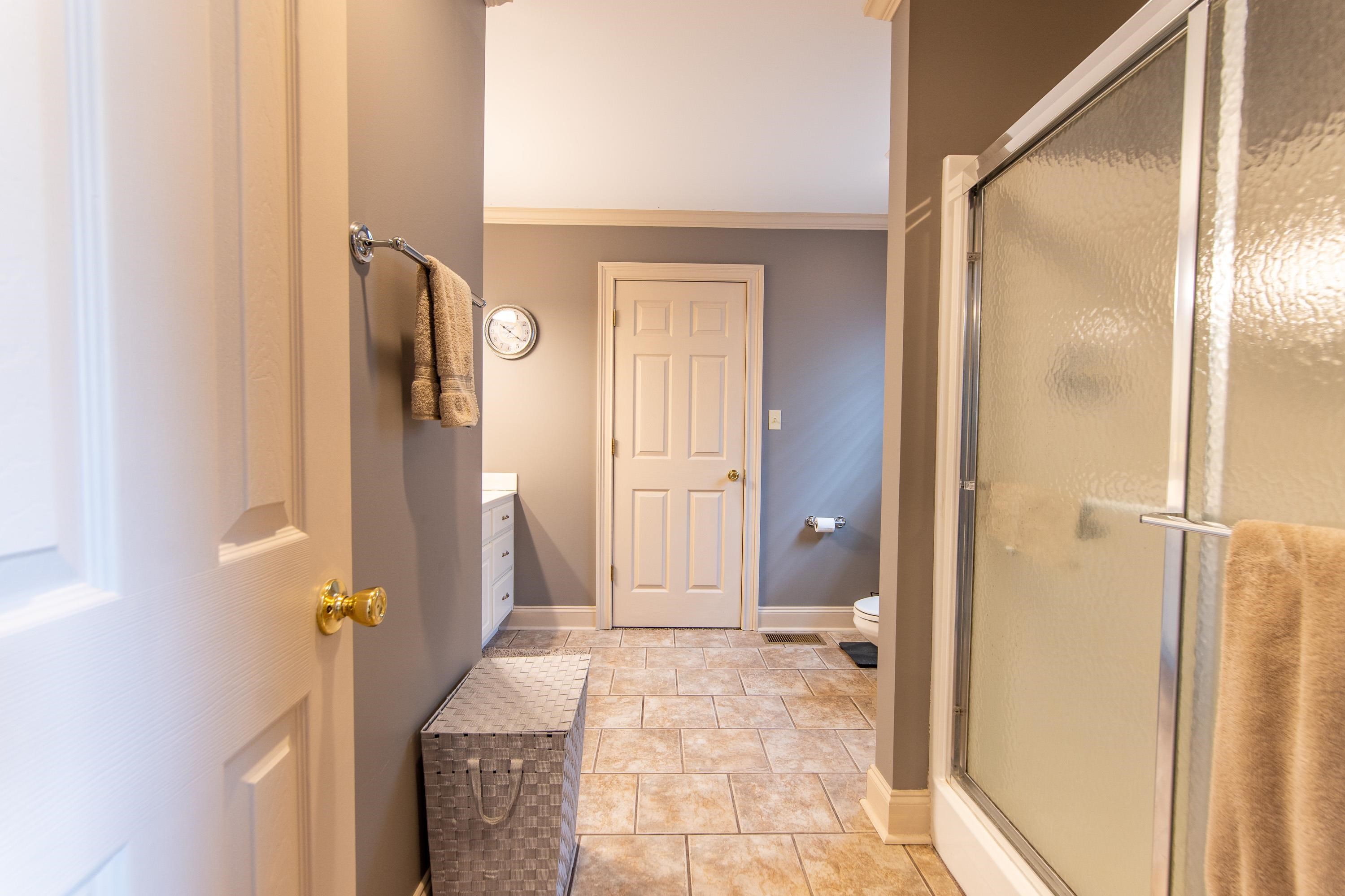 14 Cumberland Circle Iuka, MS 38852 - Photo 12 of 25 a view of a bathroom with a glass door