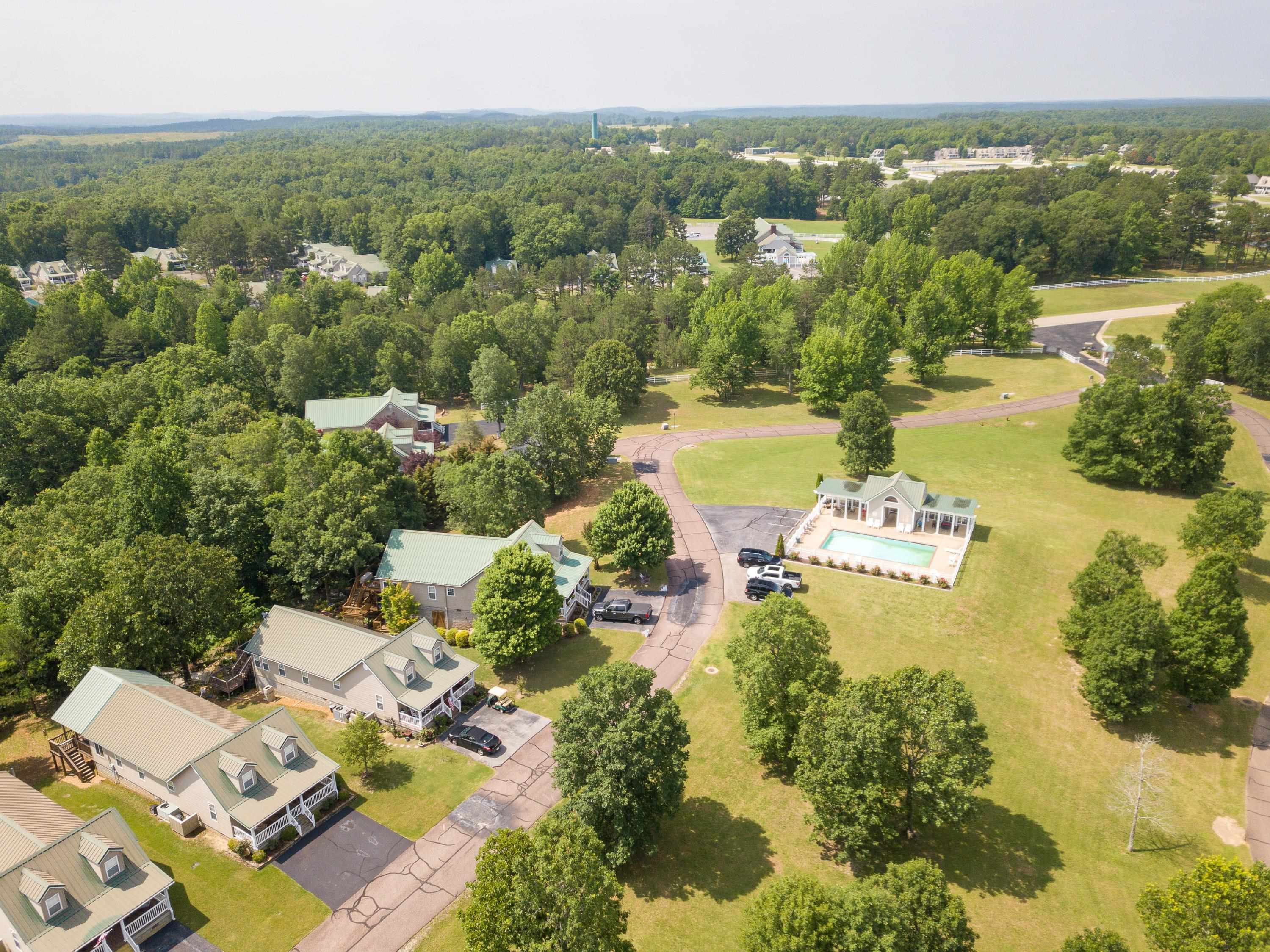 14 Cumberland Circle Iuka, MS 38852 - Photo 23 of 25 a view of a lake with a city