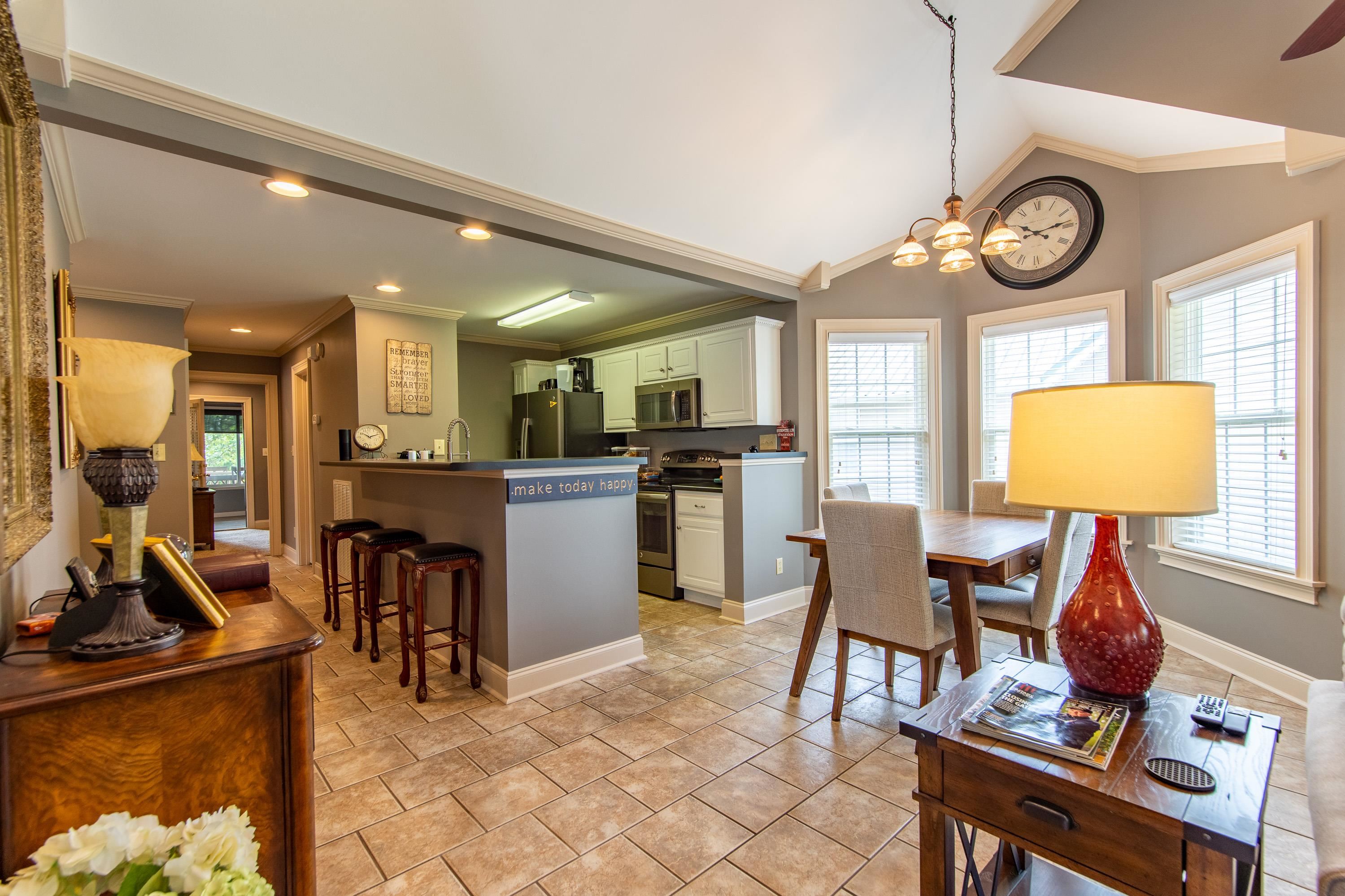 14 Cumberland Circle Iuka, MS 38852 - Photo 6 of 25 a view of a kitchen with dining table and chairs