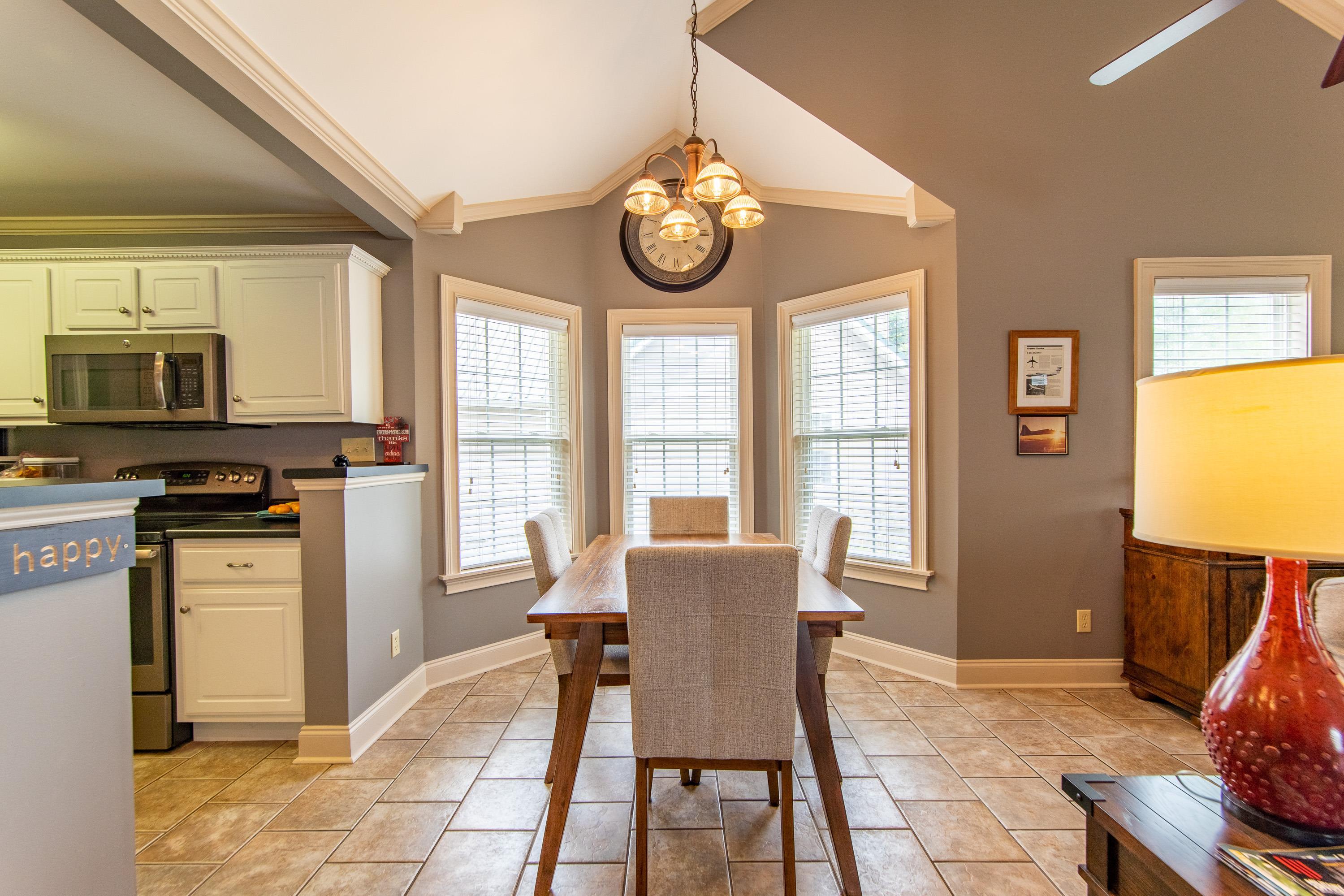 14 Cumberland Circle Iuka, MS 38852 - Photo 8 of 25 a view of a dining room with furniture wooden floor and a rug