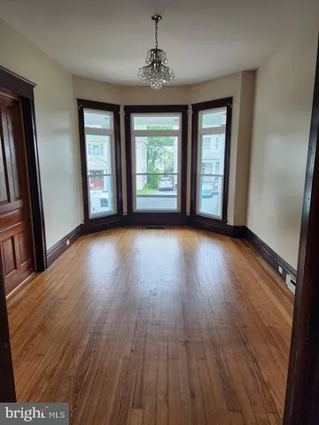 a view of livingroom with hardwood floor and window