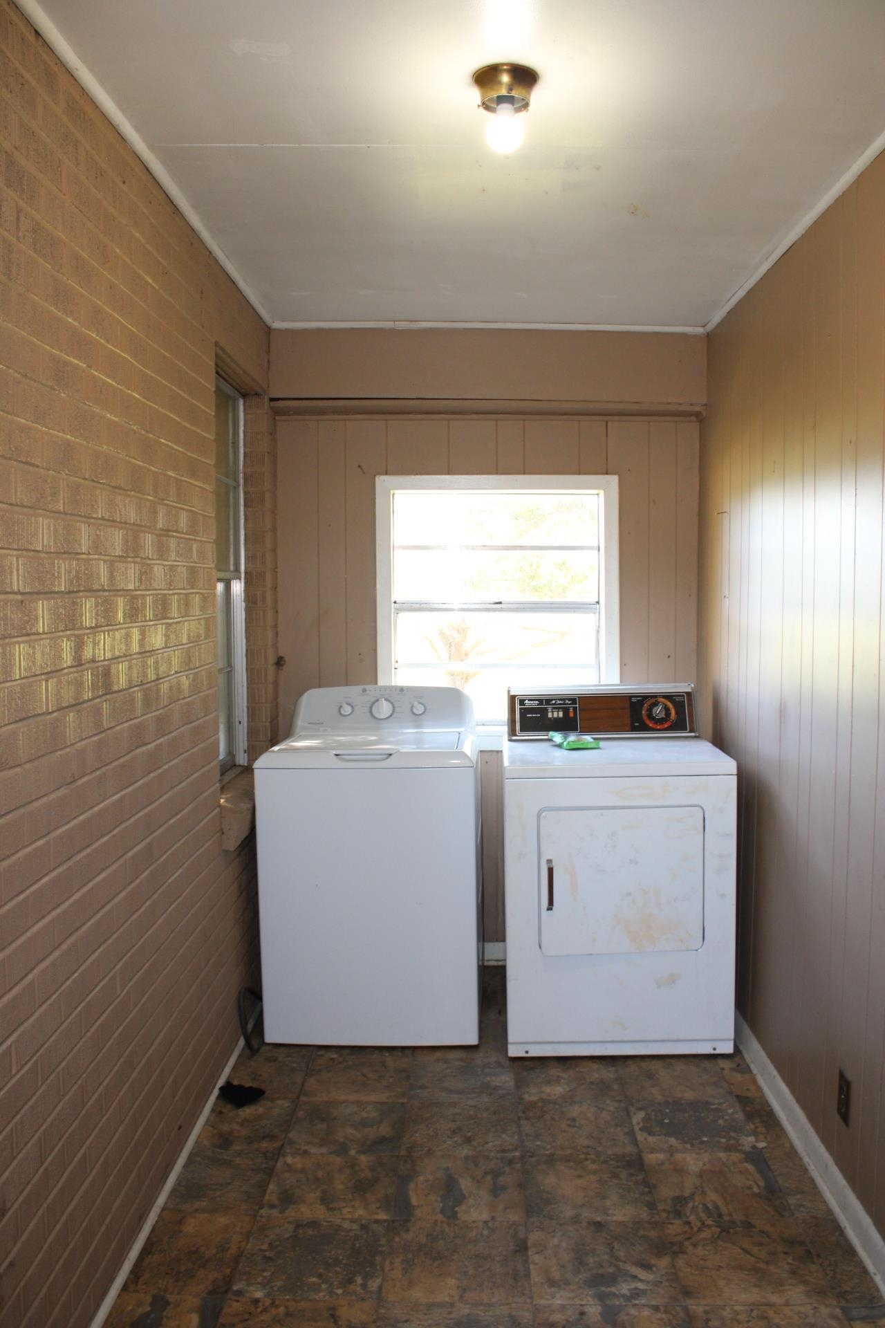 1027 Lynn School Road Ripley, TN 38063 - Photo 19 of 26 a room with a washer and dryer
