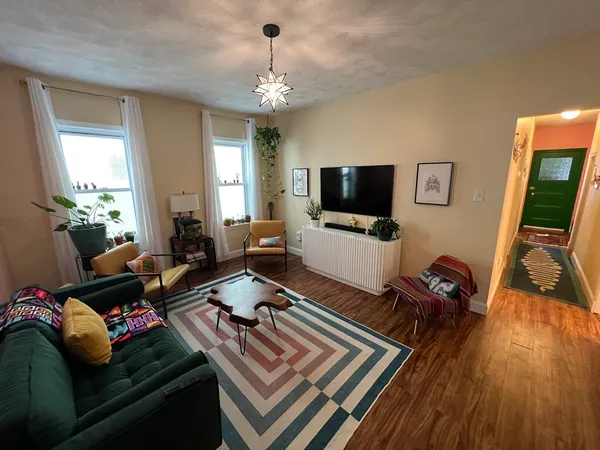 a living room with furniture and a couch