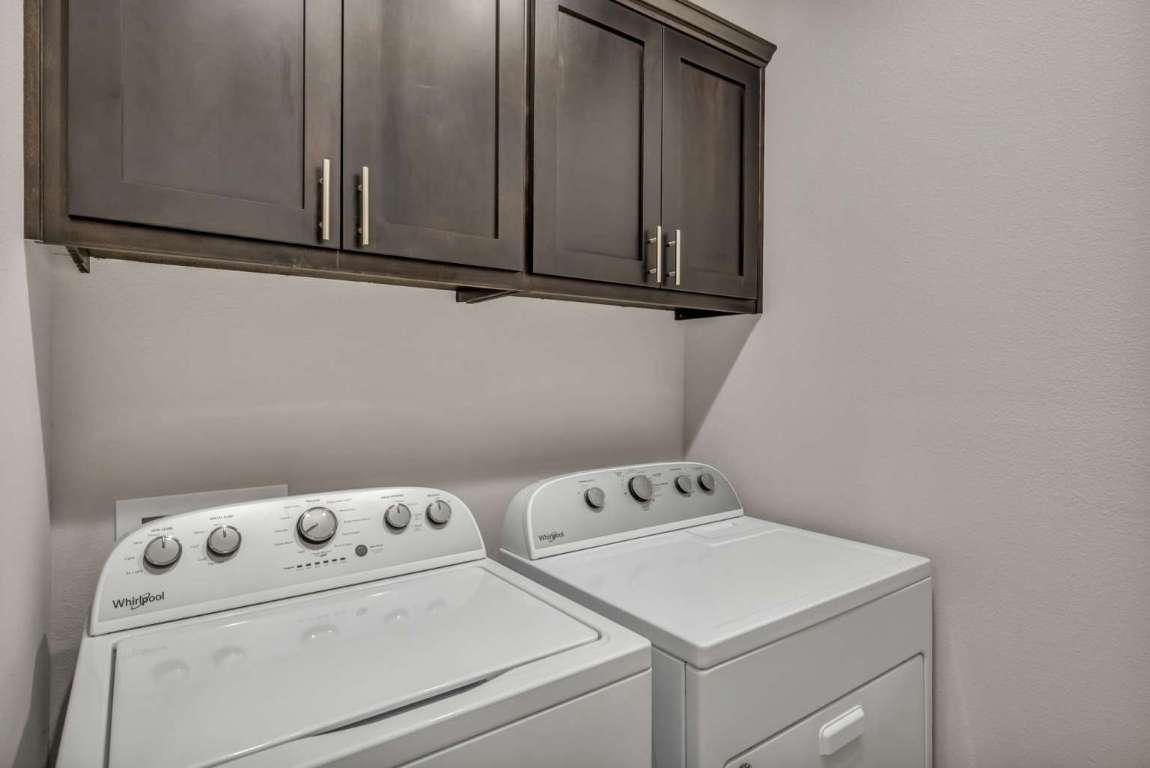 13800 Lyndhurst Street, Unit 223 Austin, TX 78717 - Photo 20 of 40 a utility room with dryer and washer