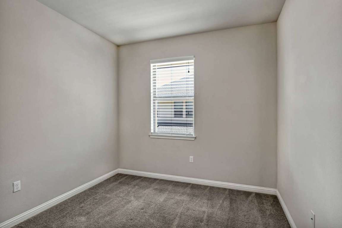 13800 Lyndhurst Street, Unit 223 Austin, TX 78717 - Photo 23 of 40 an empty room with a window