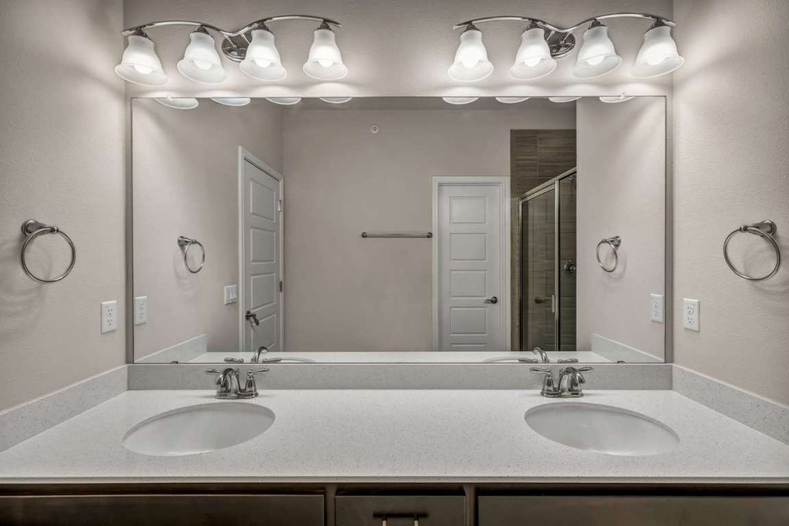 13800 Lyndhurst Street, Unit 223 Austin, TX 78717 - Photo 28 of 40 a bathroom with a sink and a mirror