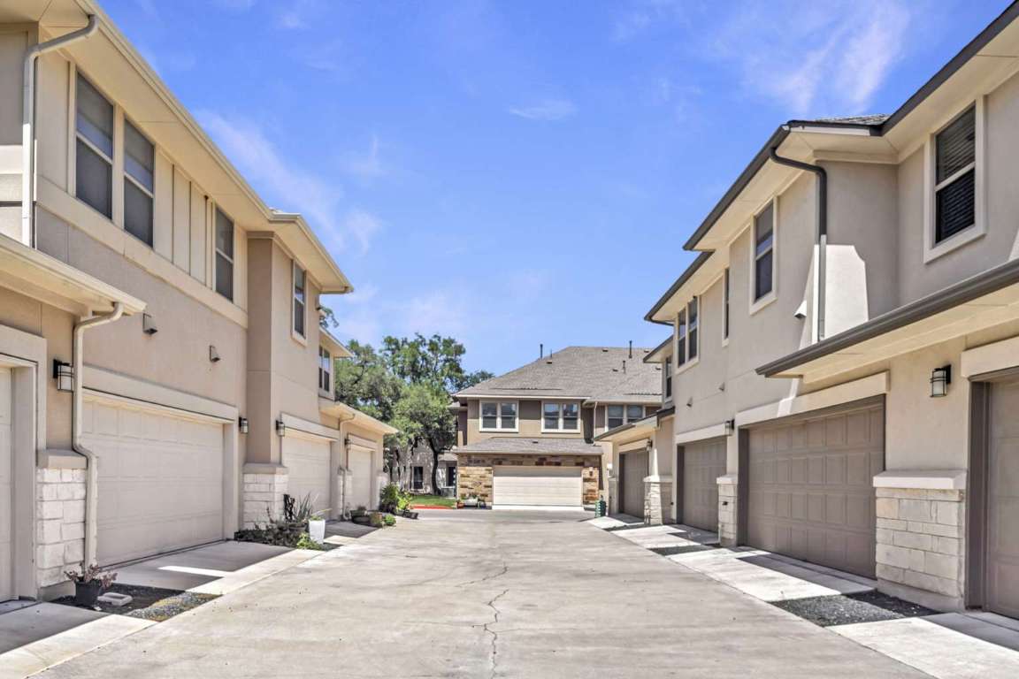 13800 Lyndhurst Street, Unit 223 Austin, TX 78717 - Photo 31 of 40 a front view of a building with a street view