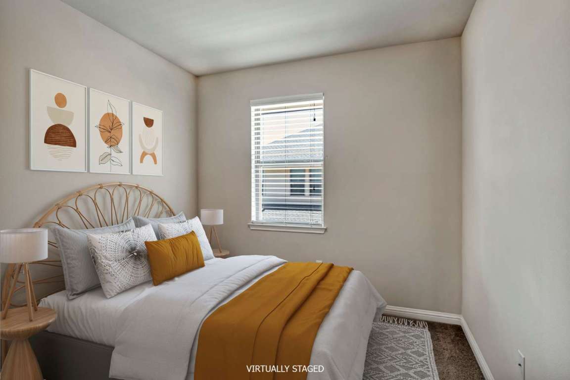 13800 Lyndhurst Street, Unit 223 Austin, TX 78717 - Photo 5 of 40 a bedroom with a bed and painting on the wall