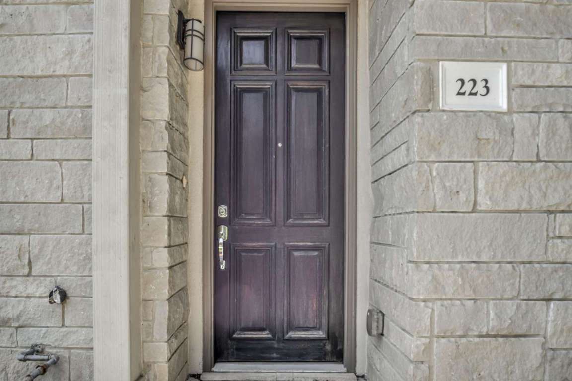 13800 Lyndhurst Street, Unit 223 Austin, TX 78717 - Photo 7 of 40 a view of a wooden door