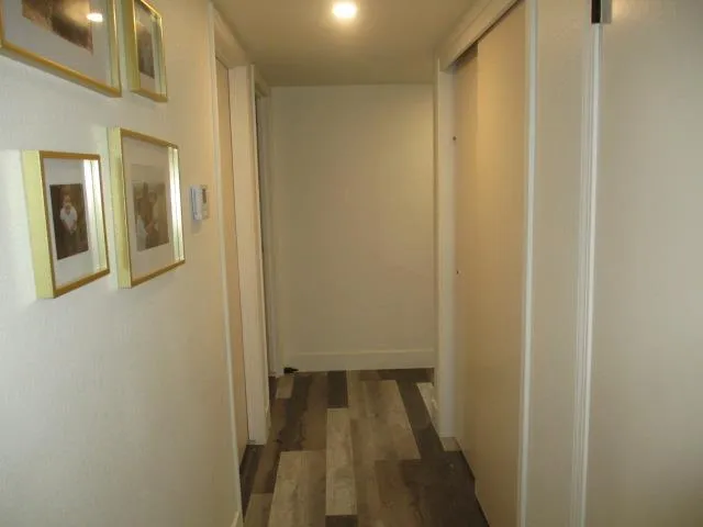 a bedroom with a bed and dresser