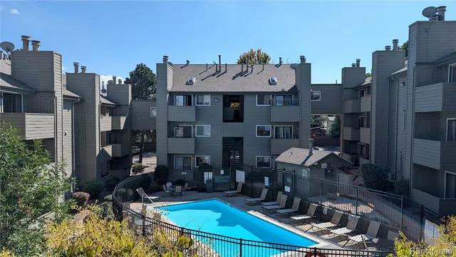 a view of multiple houses with a yard