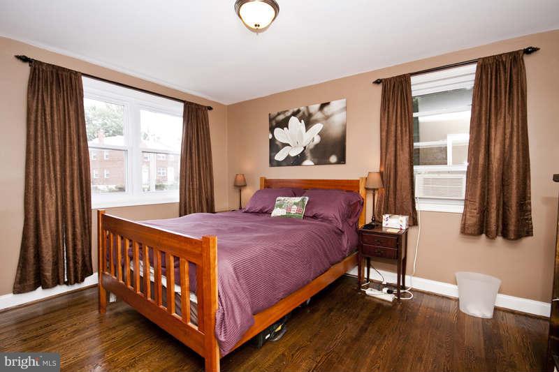 5512 Channing Road Baltimore, MD 21229 - Photo 22 of 29 a bedroom with a bed and a window