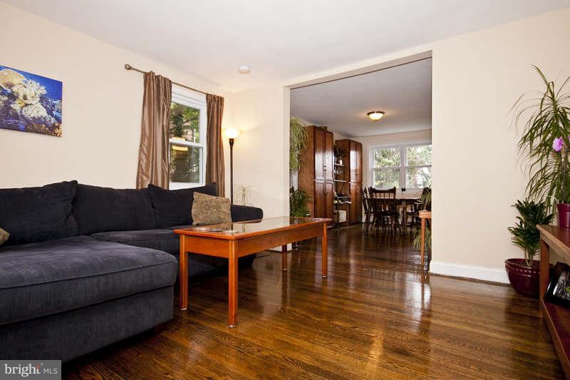 5512 Channing Road Baltimore, MD 21229 - Photo 4 of 29 a living room with furniture and wooden floor