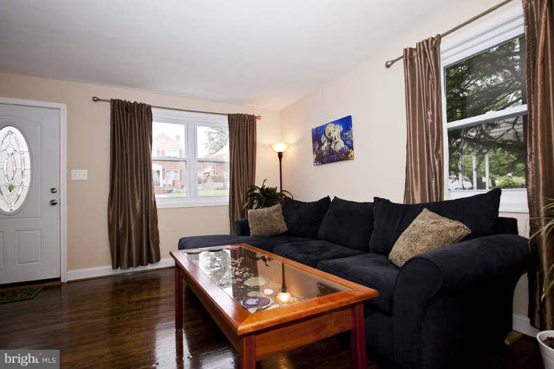 5512 Channing Road Baltimore, MD 21229 - Photo 6 of 29 a living room with furniture and a window