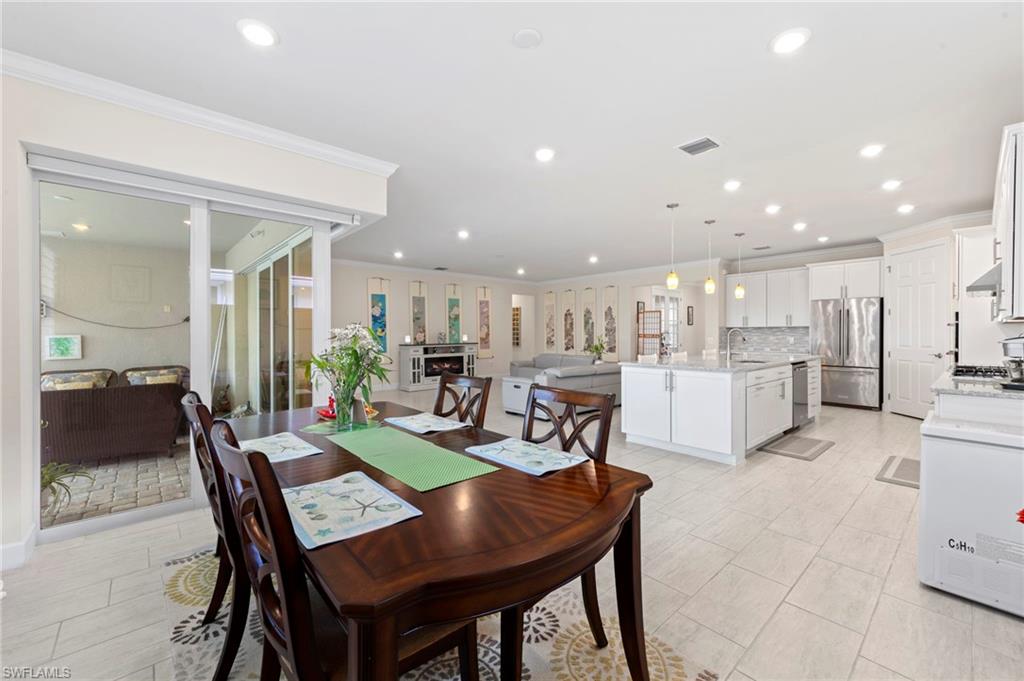 10530 Jackson Square Drive Estero, FL 33928 - Photo 16 of 48 a view of a dining area with furniture