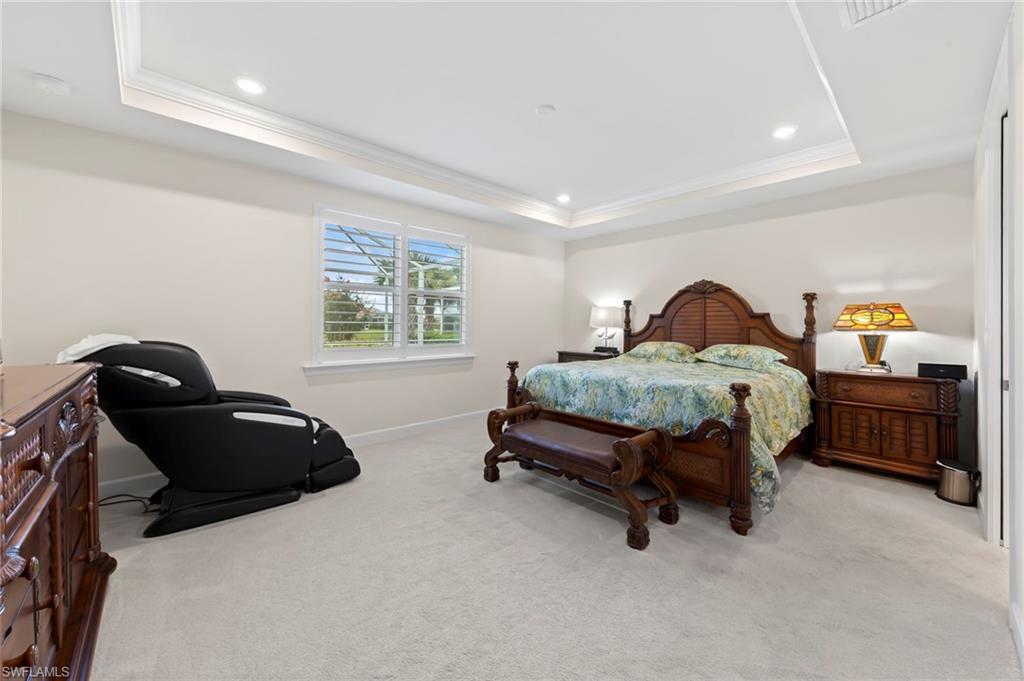 10530 Jackson Square Drive Estero, FL 33928 - Photo 21 of 48 a bedroom with furniture and a window